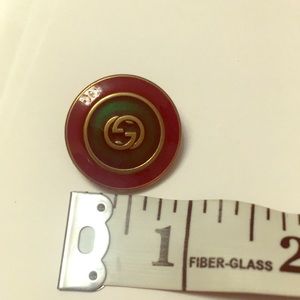 Gucci brass button large
